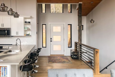 front entry and stairs to lower level