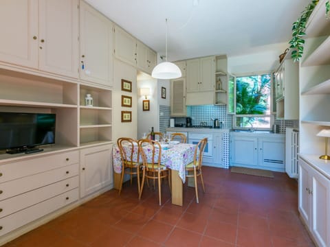 Interior Design, Flooring, Furniture, Kitchen, Floor, Wood, Ceiling, Cabinetry, Countertop, Kitchen Appliance