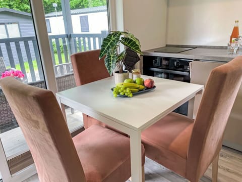 Furniture, Flooring, Table, Wood, Floor, Interior Design, Kitchen & Dining Room Table, Chair, Dining Room, Room