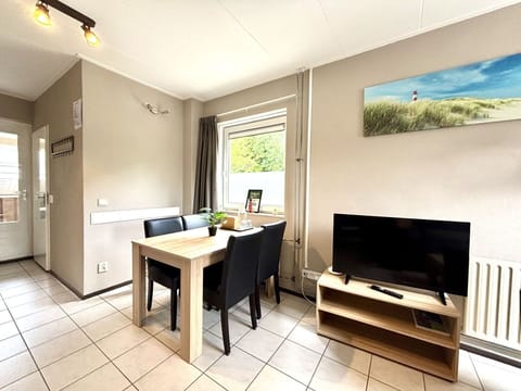 Furniture, Interior Design, Flooring, Floor, Room, Home, Apartment, Television, Ceiling