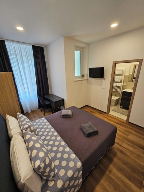 Comfort Double Room, Courtyard View | Desk, laptop workspace, blackout drapes, iron/ironing board