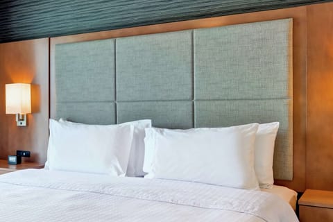 Desk, laptop workspace, blackout drapes, iron/ironing board