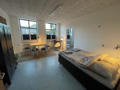 Family Room, Patio, Garden View | Free WiFi