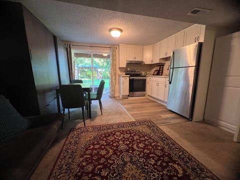 Dining, kitchen and living room area in the basement suite.