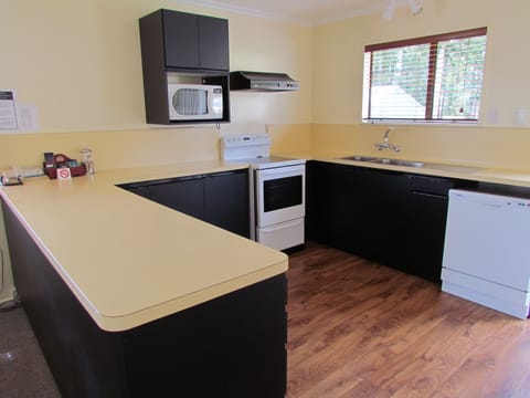 Three Bedroom Apartment | Private kitchen | Microwave, coffee/tea maker, electric kettle