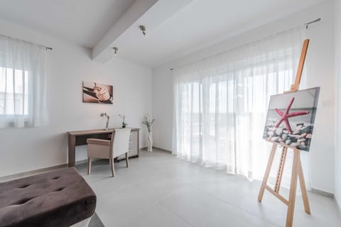 32-inch flat-screen TV with satellite channels