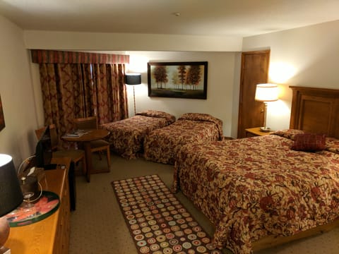 Deluxe Quadruple Room, Multiple Beds, Private Bathroom | Down comforters, individually decorated, individually furnished