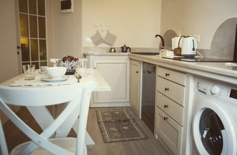 Apartment, 2 Bedrooms | Living room | Flat-screen TV