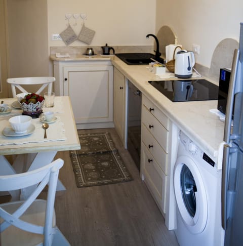 Apartment, 2 Bedrooms | Private kitchen | Full-size fridge, microwave, stovetop, dishwasher