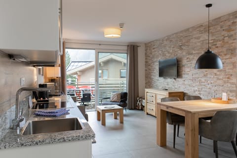 Apartment, 1 Bedroom, Balcony (Excl. 113 EUR cleaning fee) | Living area | Flat-screen TV