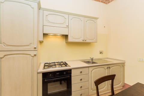 Apartment, 2 Bedrooms, Ground Floor (Scrittorio) | Private kitchen | Full-size fridge, oven, stovetop, dishwasher