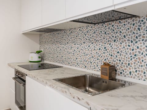 Furniture, Chair, Outdoor Furniture, Table, Outdoor Table, Kitchen & Dining Room Table, Umbrella, Shade, Restaurant, Patio