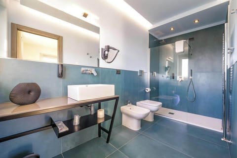 Superior Double Room, Balcony, Lake View | Bathroom | Shower, hair dryer, towels, soap