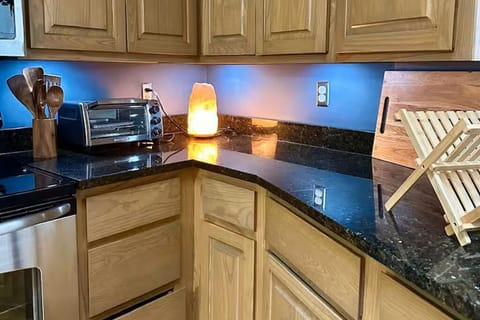 Kitchen. Granite countertops and under cabinet lights plus everything you need.