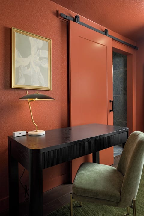 Need to check in? This chic desk setup offers a quiet, design-forward workspace.