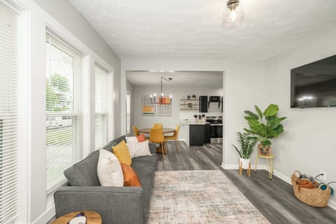 Curl up in the chic living room & stream your favorites on the smart TV