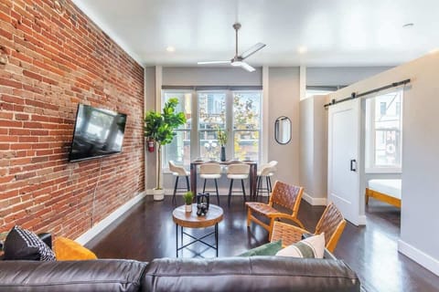 Cozy living nook with exposed brick wall