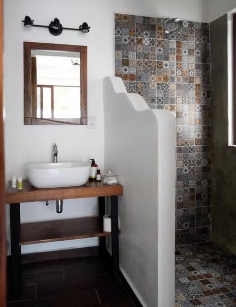 Shower, rainfall showerhead, towels, soap