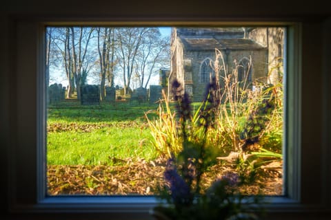 Bell Cottage in Cockermouth | View to rear Churchyard