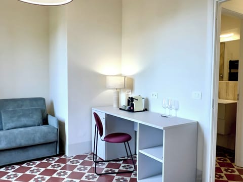 Family Suite, City View | In-room safe, desk, laptop workspace, blackout drapes