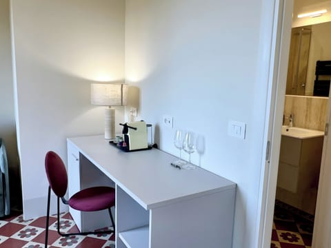 Family Suite, City View | In-room safe, desk, laptop workspace, blackout drapes