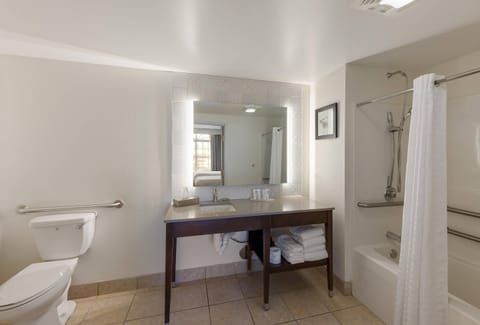 Suite, 2 Queen Beds, Non Smoking | Bathroom | Combined shower/tub, free toiletries, hair dryer, towels