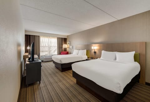 Hypo-allergenic bedding, desk, blackout drapes, soundproofing