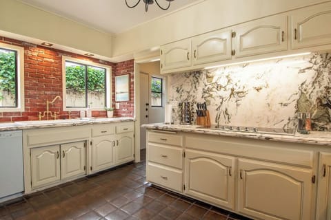 Discover the joy of cooking in the fully equipped kitchen, a haven for culinary enthusiasts.