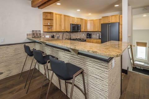 Bar seating for three people | Main Level