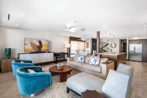 Living Room with Luxurious Furnishings and TV Entertainment