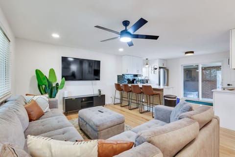 Open floor concept area featuring the living room and kitchen