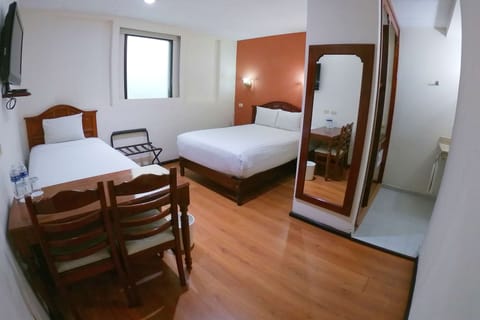 Standard Room, Multiple Beds, Non Smoking | In-room safe, iron/ironing board, free WiFi, bed sheets