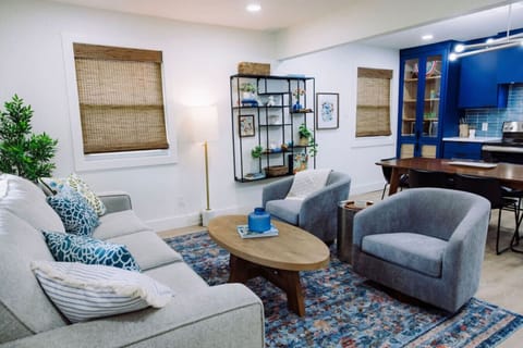 {Living room ~ Home #2} Open-concept area w/ sleeper sofa (Queen bed) and smart TV