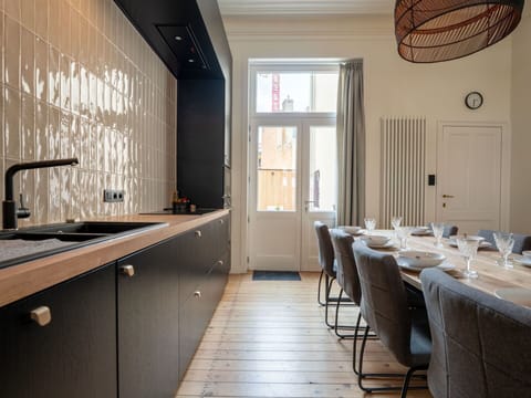 Furniture, Flooring, Interior Design, Wood, Floor, Kitchen, Light Fixture, Countertop, Lighting, Ceiling