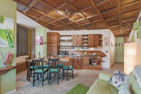 Family Apartment, 1 Bedroom (Appartamento My Home) | Living area | 21-inch TV with cable channels