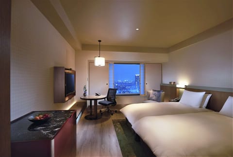 Twin Executive Room | Minibar, in-room safe, soundproofing, iron/ironing board