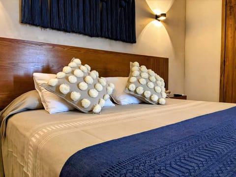 Deluxe Suite, 1 Bedroom, Air conditioning, Beach View | Minibar, in-room safe, blackout drapes, free WiFi