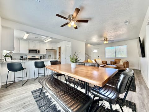 The dining table seats 6 and the bar offers room for 3 more. The kitchen is fully stocked and makes cooking your favorite meals easy and fun.
