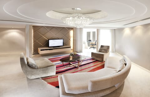 Executive Suite | Living area | 32-inch LCD TV with satellite channels, TV