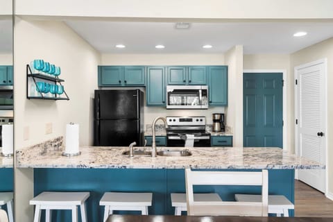 Additional counter seating at the full kitchen