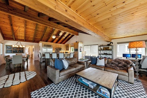 Open-concept kitchen and living room keep everyone connected—perfect for cooking, relaxing, and making memories together.