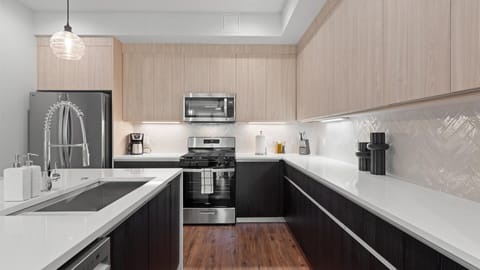 Pristine Modern Kitchen with Silver Appliances