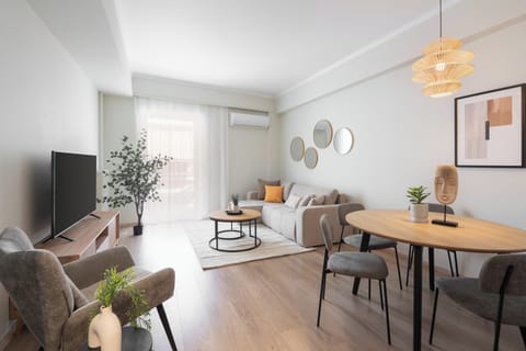 Superior Apartment, 2 Bedrooms, Balcony, City View | Living area | 50-inch TV with cable channels