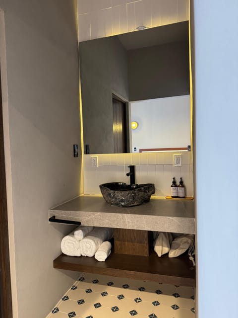 Comfort Room, 1 King Bed | Bathroom | Shower, hair dryer, towels, soap