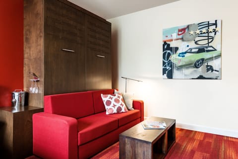 Junior Suite | Living area | Flat-screen TV, iPod dock