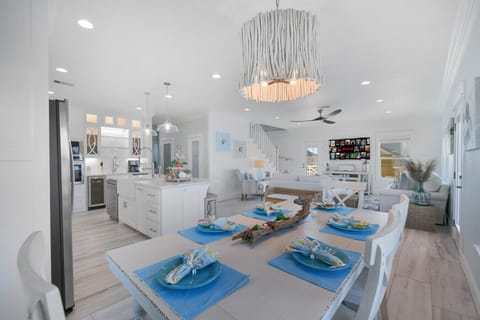 Gather for meals with an ocean breeze feel