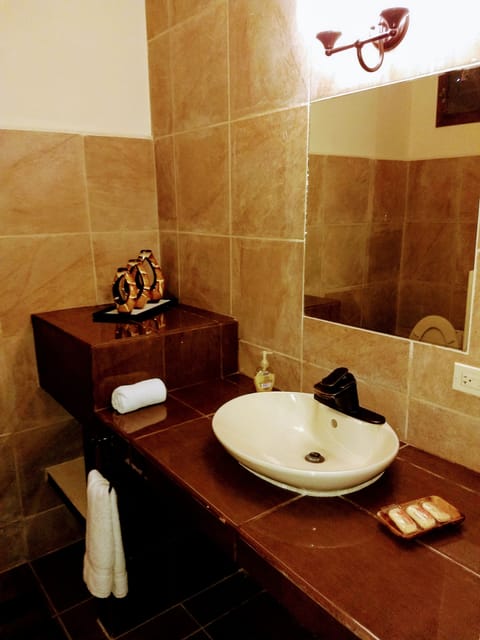 Premier Suite, 1 Queen Bed | Bathroom sink