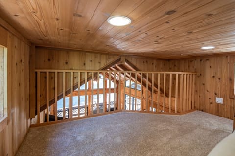 Loft Area with a View of the Living Room