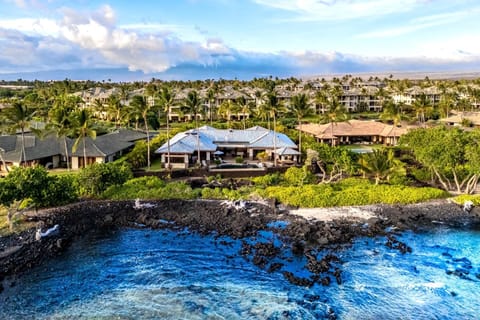Perched at the edge of the Pacific, Kolea Kai offers unparalleled oceanfront luxury with sweeping views of lava rock shores, turquoise waters, and lush tropical surroundings on the Big Island Hale Nani at Kolea Kai