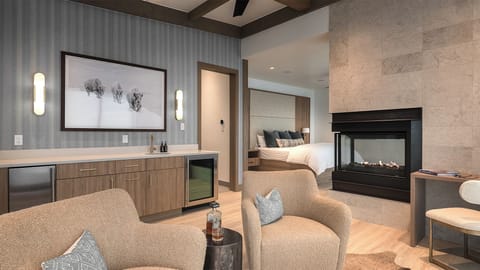Primary king suite with bar and additional seating area